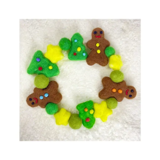 nube | Handmade Wool Christmas tree garland in gingerbread man